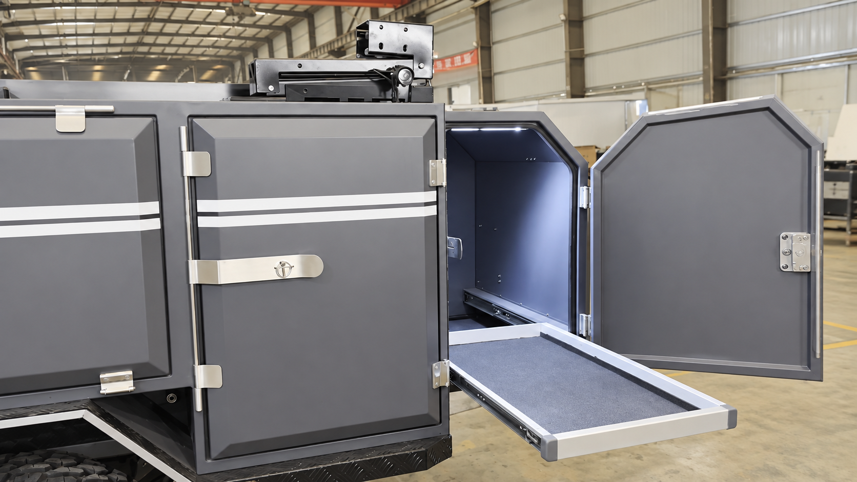 Base Camp 3B open storage compartment with extended slide-out tray